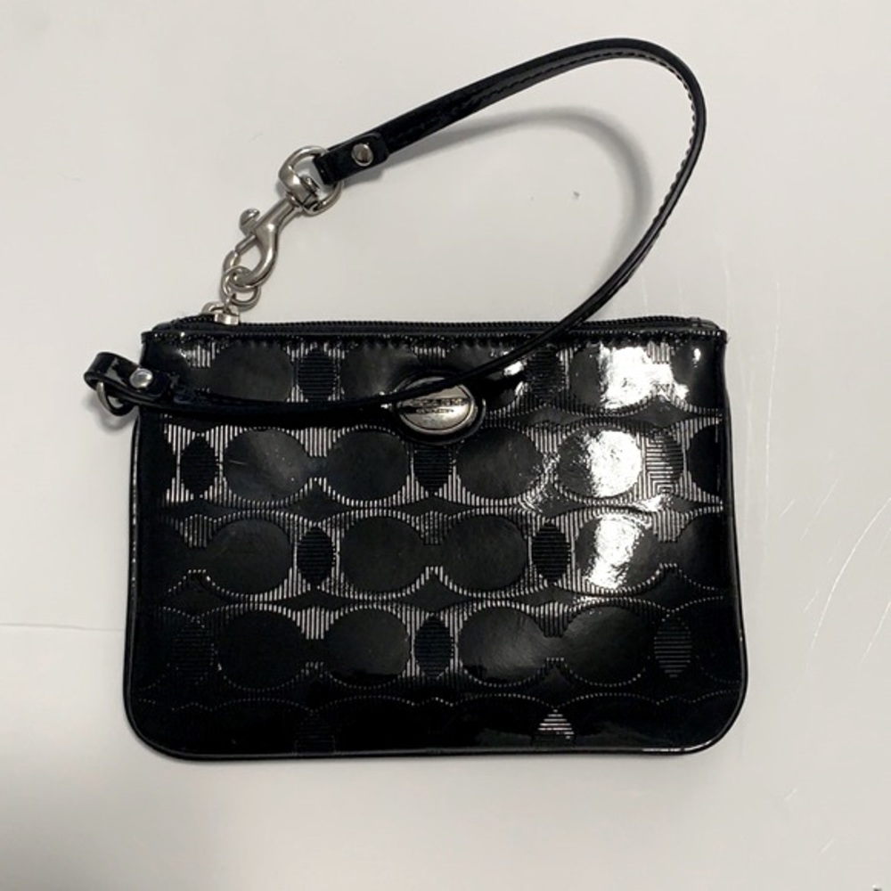 • Black coach wristlet •